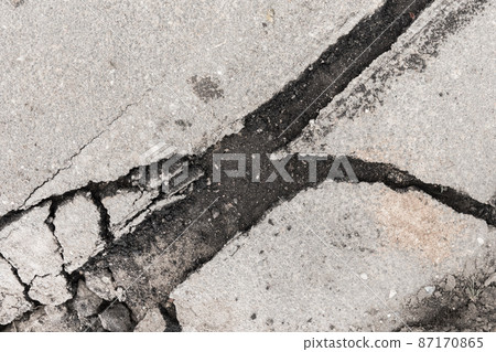 Large crack stratification separation of asphalt road broken damaged stone surface Large crack stratification separation of asphalt road broken damaged stone surface 87170865