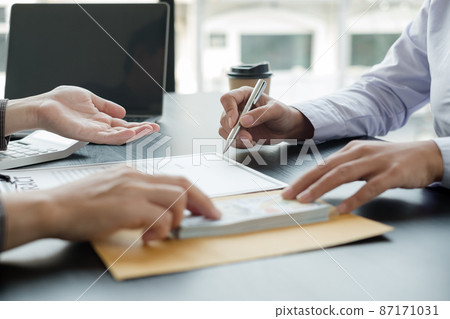 Corruption. Businessmen make an agreement with the money proposed his partner to bribe in the office and make a contract under an agreement. Illegal money fraud The concept of bribery and corruption Corruption. Businessmen make an agreement with the money proposed his partner to bribe in the office and make a contract under an agreement. Illegal money fraud The concept of bribery and corruption 87171031