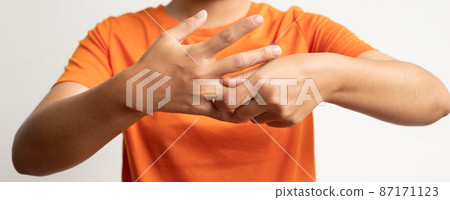 Woman hand with numbness and pain in the fingers, pain, and tingling in the nerve endings. which is a side effect of Guillain-Barre Syndrome after vaccination against COVID-19 Woman hand with numbness and pain in the fingers, pain, and tingling in the nerve endings. which is a side effect of Guillain-Barre Syndrome after vaccination against COVID-19 87171123