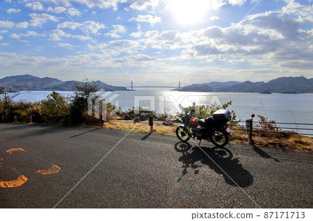 View of Mukaishima and Innoshima from Iwashi Island on the Shimanami Kaido View of Mukaishima and Innoshima from Iwashi Island on the Shimanami Kaido 87171713