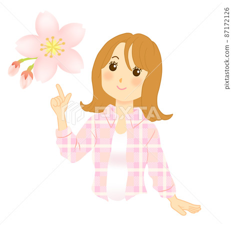 A woman pointing at a cherry blossom A woman pointing at a cherry blossom 87172126