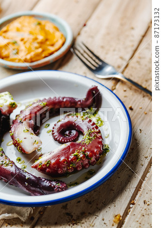 cooked octopus and catalan romesco sauce cooked octopus and catalan romesco sauce 87173132