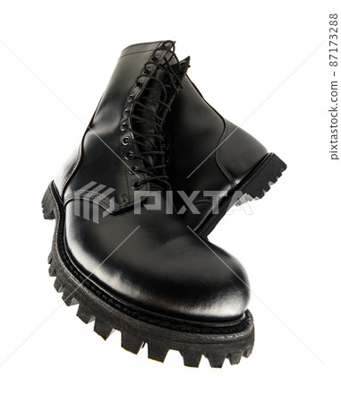 ultra wide angle view on pair of black leather 10-inch new military combat boots, isolated on white background ultra wide angle view on pair of black leather 10-inch new military combat boots, isolated on white background 87173288