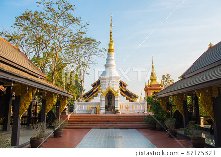 Wat Phra That Doi Phra Chan one of the most beautiful Buddhist temple on the hills in Lampang province of Thailand at sunrise. Wat Phra That Doi Phra Chan one of the most beautiful Buddhist temple on the hills in Lampang province of Thailand at sunrise. 87175321