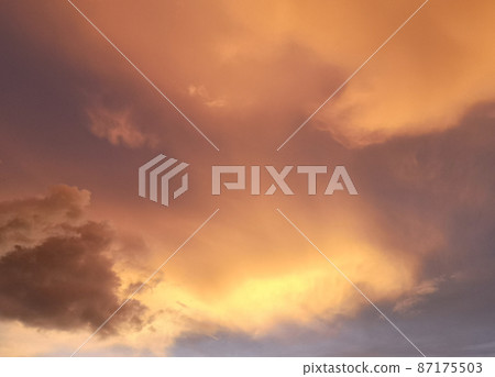 sky sunset golden color background of evening with sunlight coming through clouds view before sunset and good atmosphere sky sunset golden color background of evening with sunlight coming through clouds view before sunset and good atmosphere 87175503