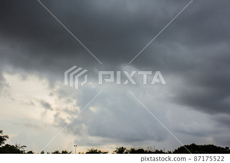 Dark sky and dramatic black cloud before rain. Dark sky and dramatic black cloud before rain. 87175522