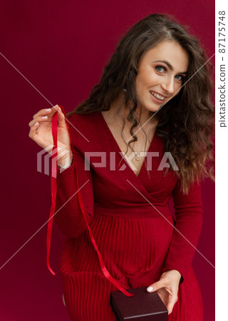 Beautiful female taking box present for Women Day 87175748