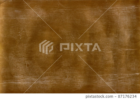 Old brown scratched surface. 87176234