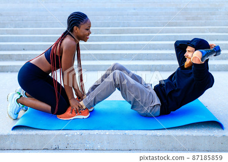 mixed race friends fitness training together outdoors summer morning mixed race friends fitness training together outdoors summer morning 87185859