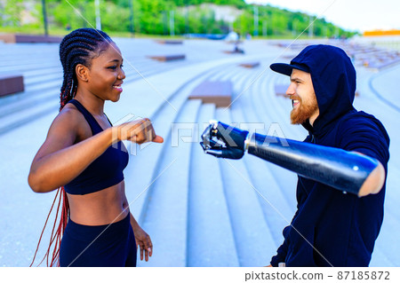 mixed race friends fitness training together outdoors summer morning mixed race friends fitness training together outdoors summer morning 87185872