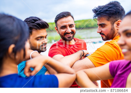 Young people friends bump their elbows to greeting 87186684