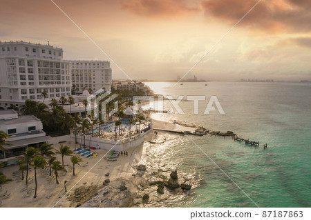 View of beautiful Hotels in the hotel zone of Cancun at sunset. Riviera Maya region in Quintana roo on Yucatan Peninsula 87187863