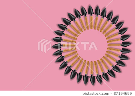 A composition of small garden shovels assembled in a circle on a pink background, a place to copy. Concept: a poster for the design of advertising media for the garden. 87194699
