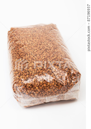 buckwheat in transparent bag on white background buckwheat in transparent bag on white background 87196937