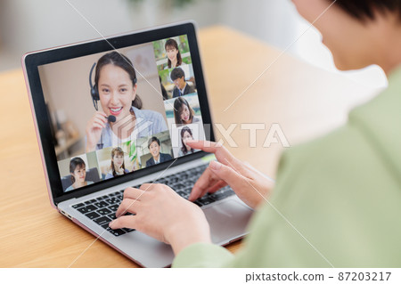 Women attending online meetings at home Women attending online meetings at home 87203217