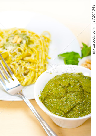 Italian traditional basil pesto pasta ingredients 87204048
