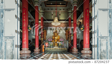 Architecture of chinese-style temple with the Golden buddha statue inside the Wat Bhoman Khunaram. Architecture of chinese-style temple with the Golden buddha statue inside the Wat Bhoman Khunaram. 87204237