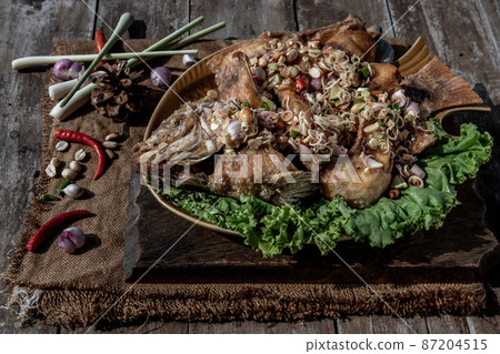 Deep fried whole Tubtim fish with spicy lemongrass salad, Food for health. Deep fried whole Tubtim fish with spicy lemongrass salad, Food for health. 87204515