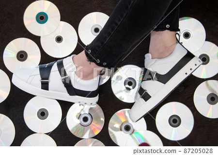 Girl in white sneakers Girl in white sneakers 87205028