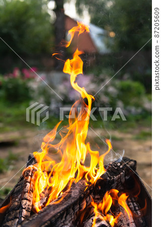 Burning wood close-up 87205609