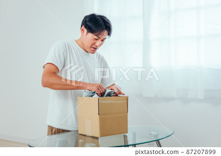 A man who bought clothes online A man who bought clothes online 87207899