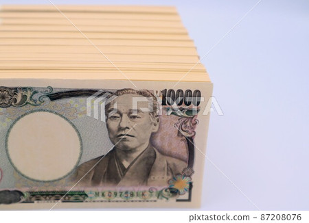 A close-up of a large amount of 10,000 yen bills 87208076