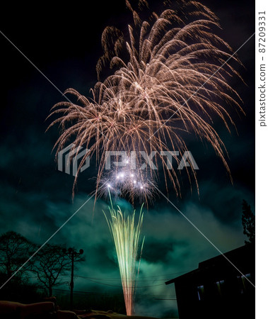 Launch fireworks blooming in the snowy mountains 87209331
