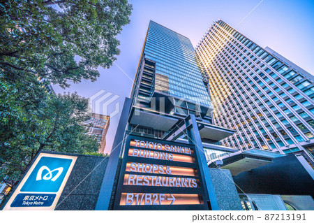 View of Tokyo cityscape in Japan, such as the skyscraper "Tokyo Sankei Building" that connects to Otemachi Station 87213191