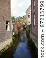 A stream flowing through the city 87213799