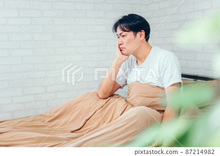 A man in the bedroom (unwell) A man in the bedroom (unwell) 87214982