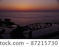 Sunset over rice terraces in the Sea of Japan 87215730