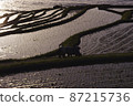 Sunset over rice terraces in the Sea of Japan 87215736