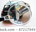 Image of examining black car tires and tail lamps at vehicle inspection or daily inspection 87217949