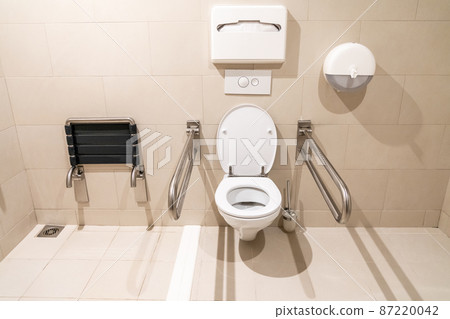 Public restroom for disabled people with special equipment 87220042