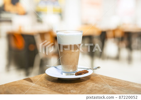 cappuccino coffee glass with spoon wooden table cappuccino coffee glass with spoon wooden table 87220052