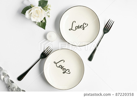 top view wedding plates with white background 87220358
