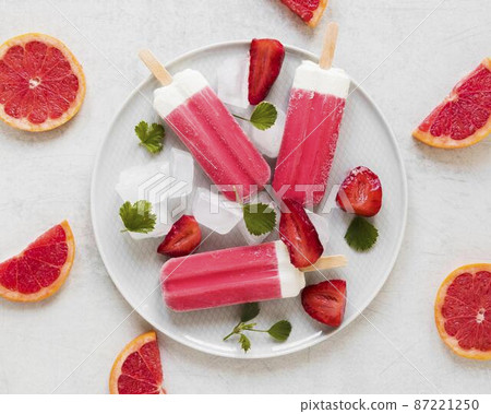 top view yummy popsicles plate with red grapefruit top view yummy popsicles plate with red grapefruit 87221250