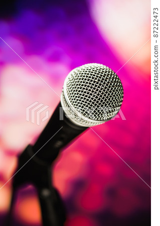 microphone against purple background 87222473
