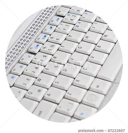 A white color laptop and Q keyboard detail 87222607