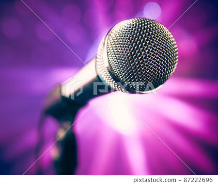 microphone on stage against purple rays 87222696