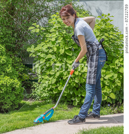 Working in garden 87222789