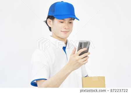 Male courier company smartphone white background Male courier company smartphone white background 87223722
