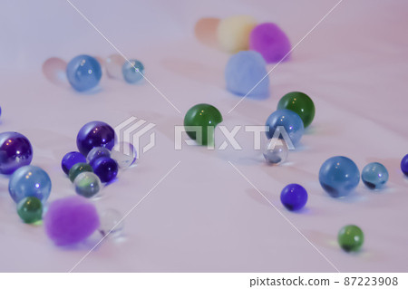 Colorful marbles and cotton balls Colorful marbles and cotton balls 87223908