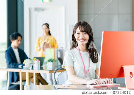 Young engineer working in the office Young engineer working in the office 87224012
