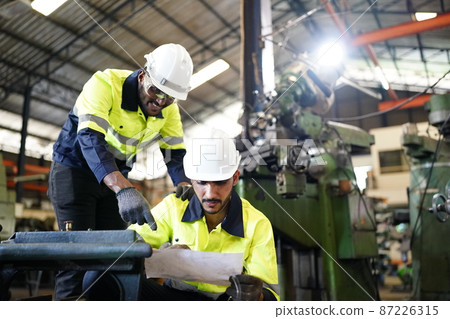 Professional men engineer worker skills quality, maintenance, training industry factory worker , warehouse Workshop for factory operators, mechanical engineering team production. 87226315