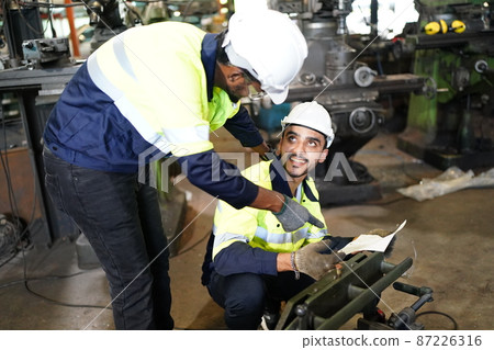 Professional men engineer worker skills quality, maintenance, training industry factory worker , warehouse Workshop for factory operators, mechanical engineering team production. 87226316