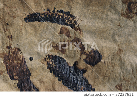 abstract background - burnt parchment paper abstract background - burnt parchment paper 87227631