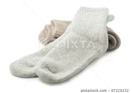 grey sheep wool socks isolated on a white background grey sheep wool socks isolated on a white background 87228232