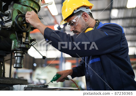 Professional men engineer worker skills quality, maintenance, training industry factory worker , warehouse Workshop for factory operators, mechanical engineering team production. 87230365