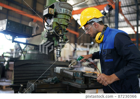 Professional men engineer worker skills quality, maintenance, training industry factory worker , warehouse Workshop for factory operators, mechanical engineering team production. 87230366